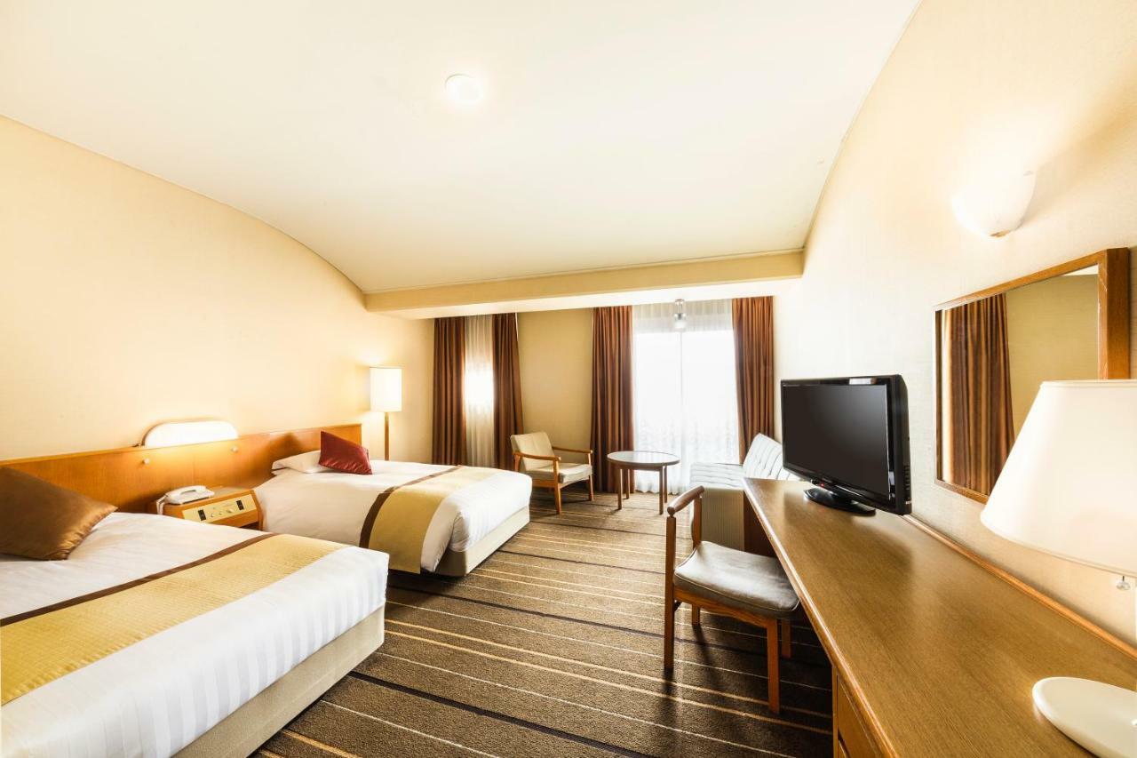 Senri Hankyu Hotel Osaka Toyonaka Bagian luar foto